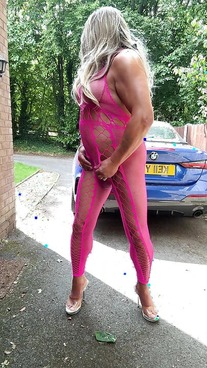 Sexy Crossdresser Kellycd2022's in pink fishnet catsuit and heels