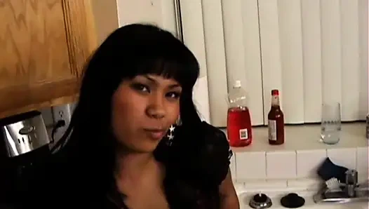Cute Asian Girl Sucks a Big Black Cock and Gets Fucked in the Kitchen