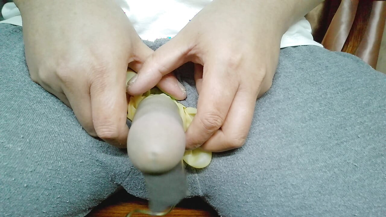 Wearing translucent latex gloves and using a vibrator to achieve multiple orgasms