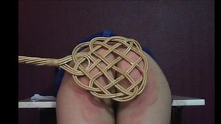 asian gets the carpet-beater