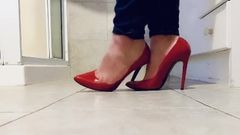 Playing in her red stilettos