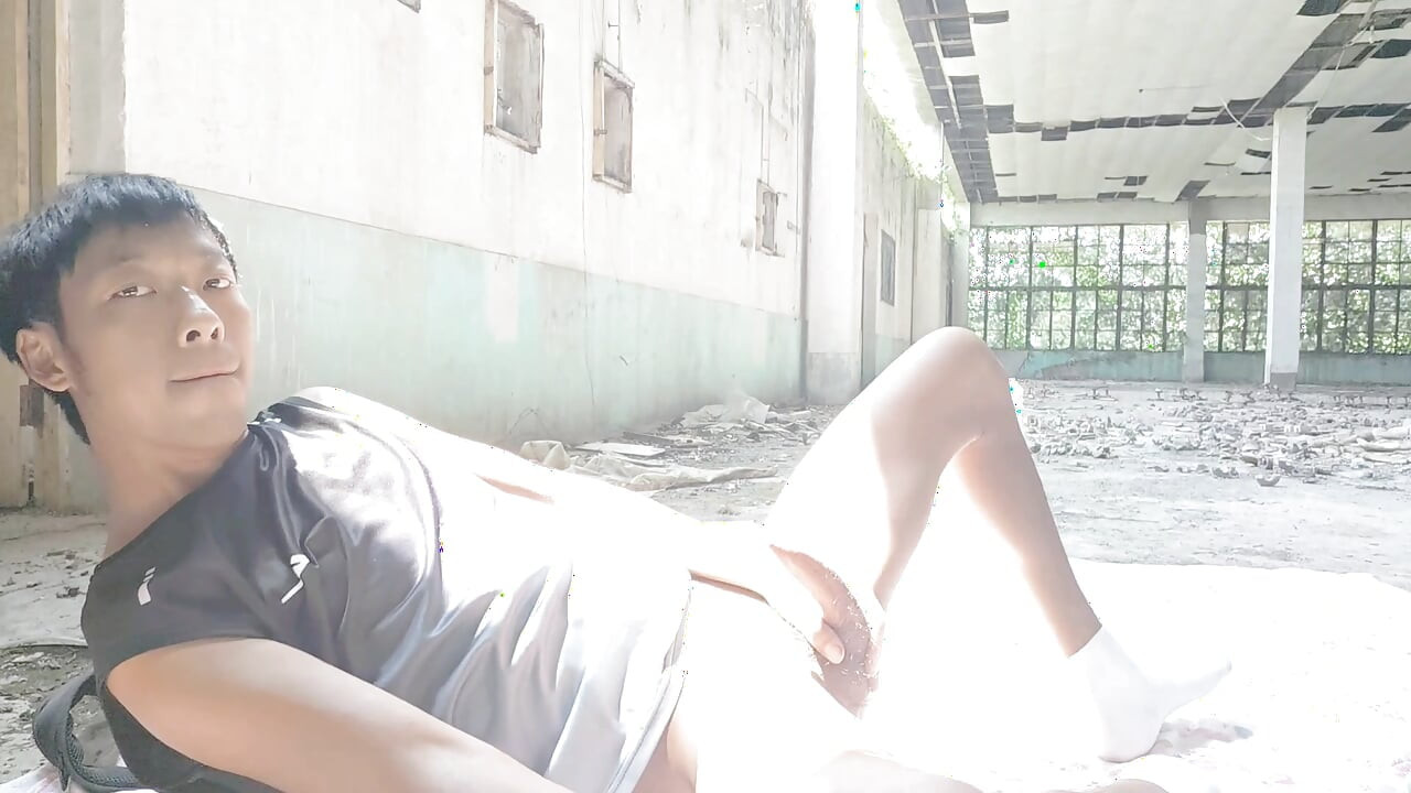 Cute Asian boy masturbates, moaning, ejaculating, and consuming fluids in a dreamlike light and shadow environment
