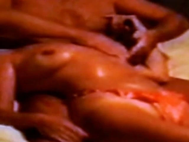 Oiling my wife's tanned tits