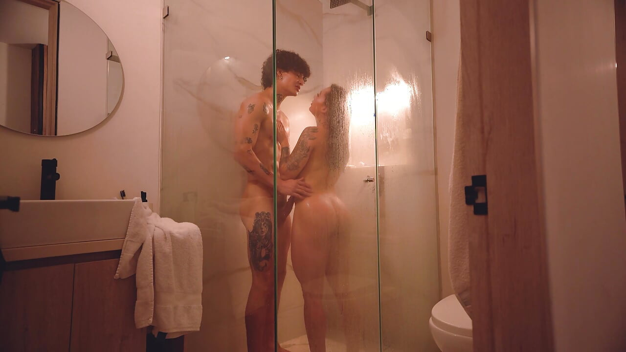 Real, passionate sex in the shower! I can't hold back and I cum in her ass