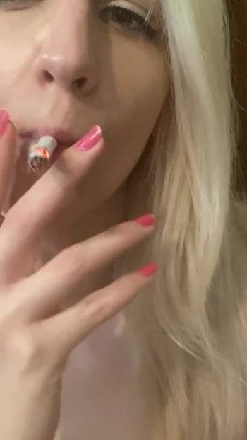Jaw-dropping moment from "Hairy girl in black panties smoking and playing around fetish video"