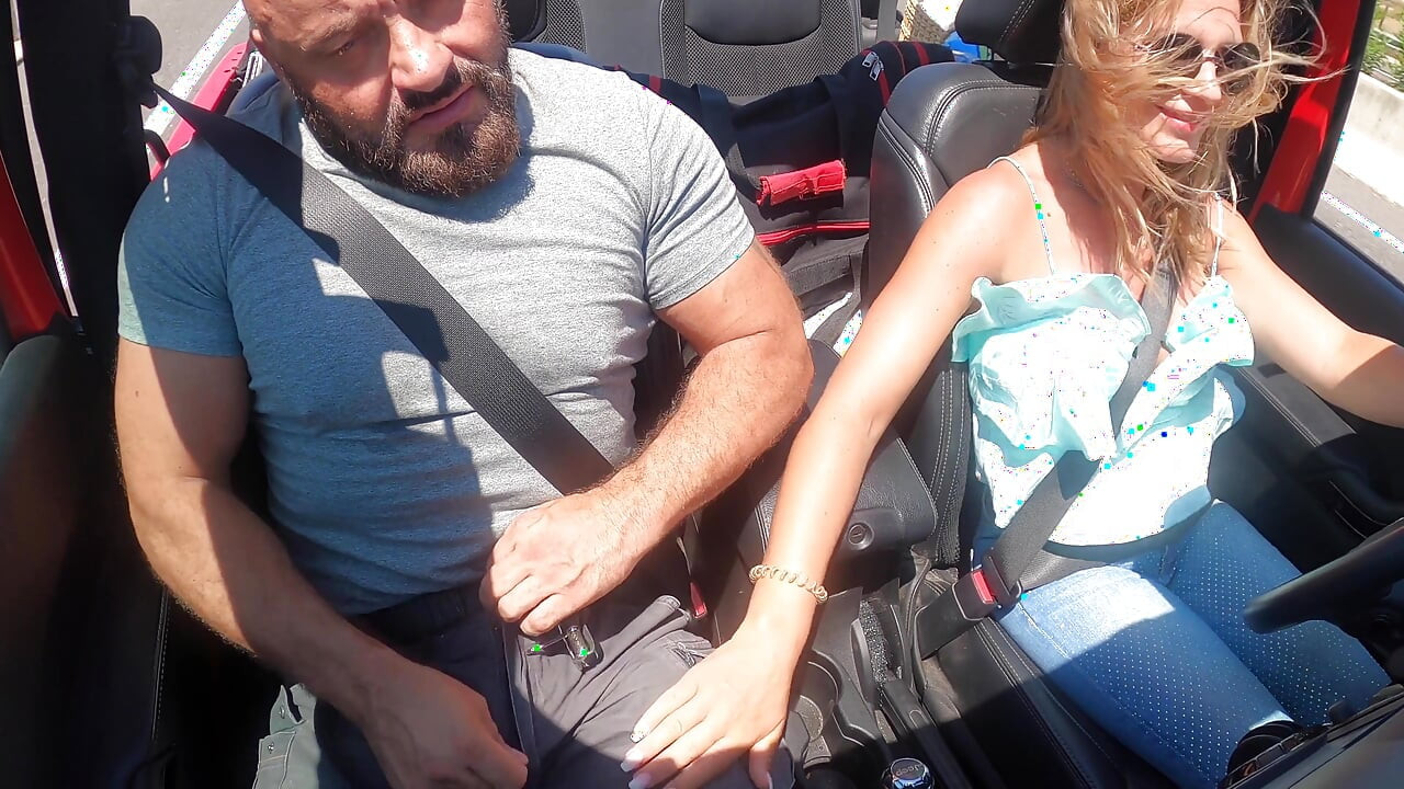 Busty Blonde MILF Gives Road Head While Driving