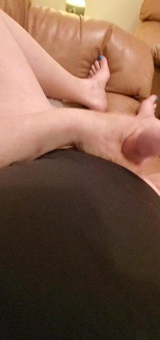 Shaved smooth tiny penis with pedicure