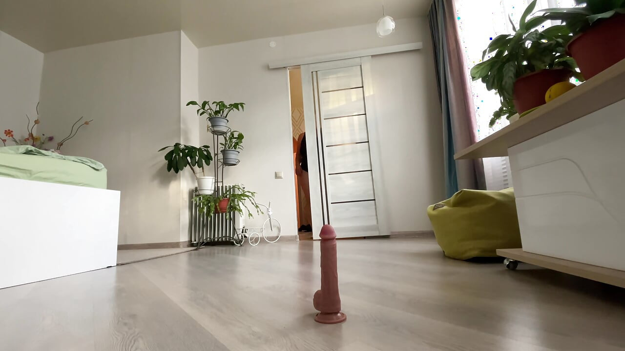 The stepsister found a rubber penis and began to play with it.