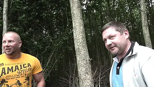 Blonde sucks two cocks then gets fucked to cumshot in the bushes