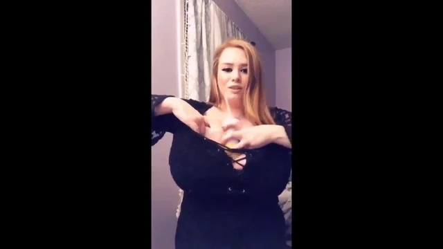 Yungfreckz sticks things between her huge melons