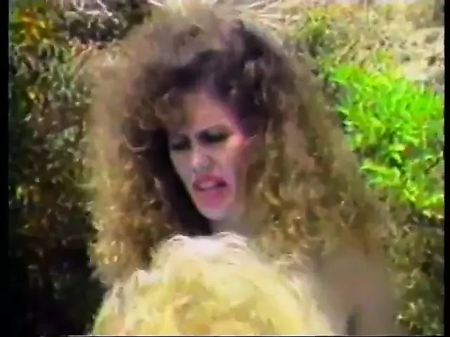 Retro lesbian blond gets her asshole fucked using dildo outdoors