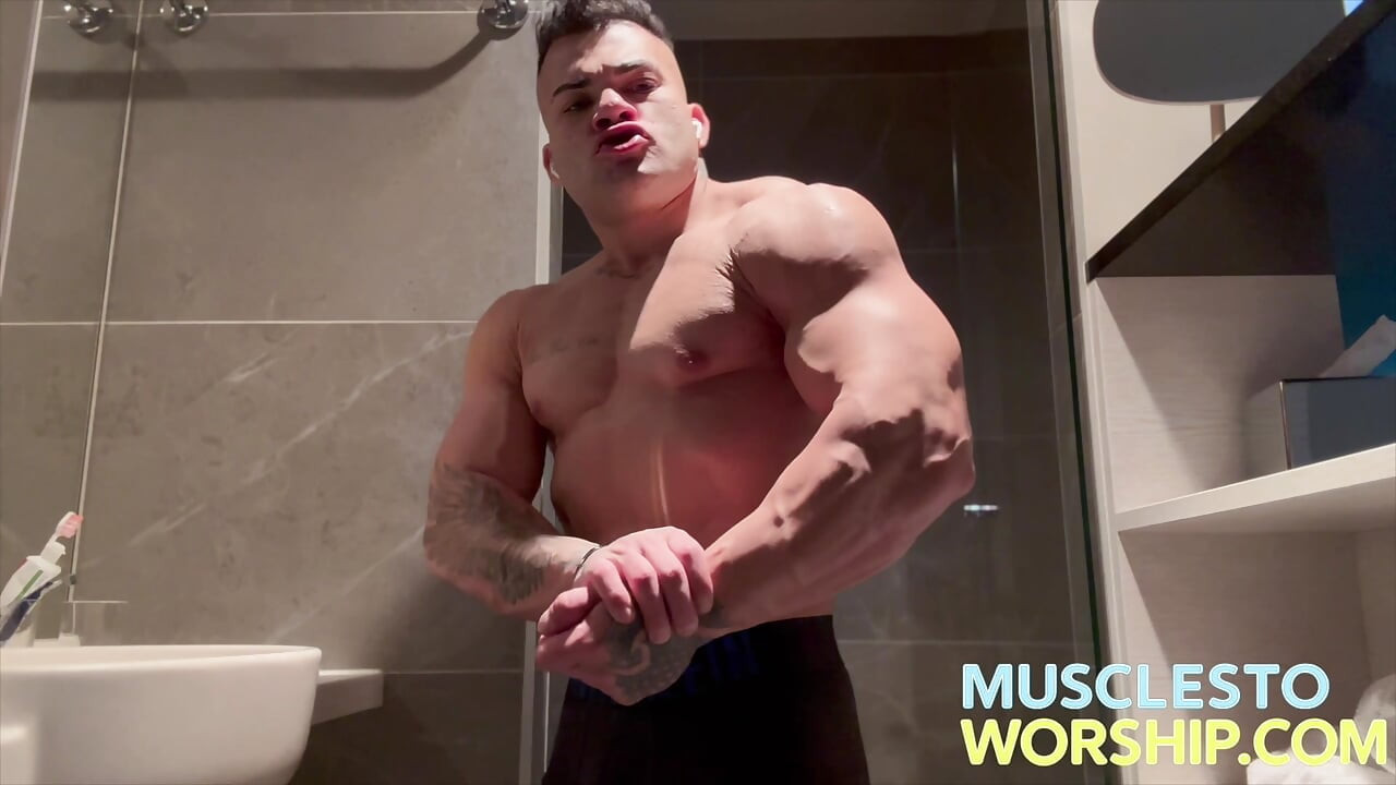 Young Alpha Bodybuilder Flexes Big Muscles