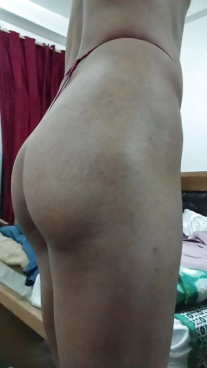 My stepdaughter is erased wearing a thong, and my wife kissed me