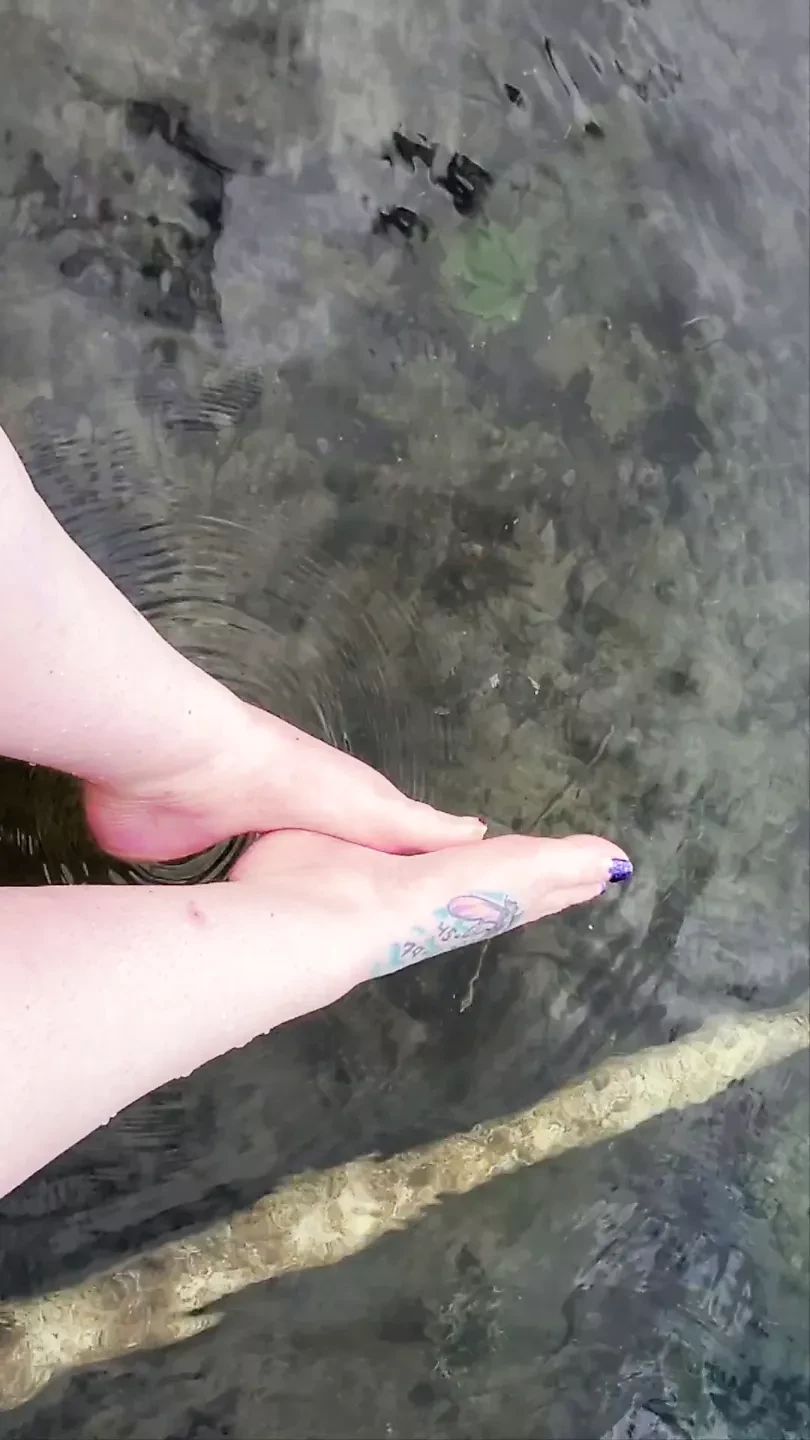 Soft pretty feet in the water