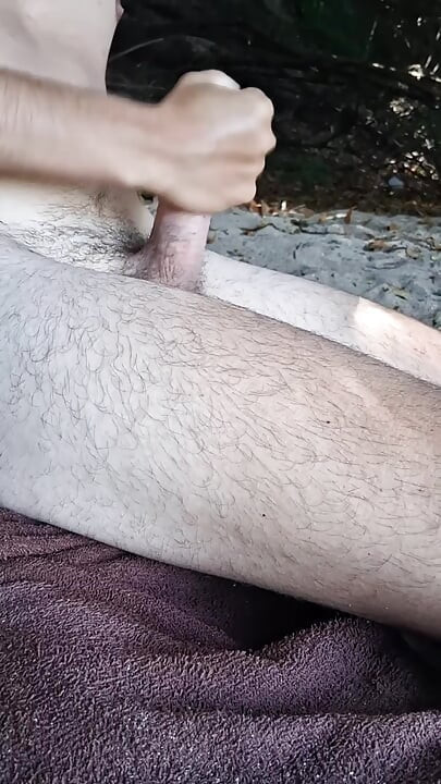 Jerking off hot in the river