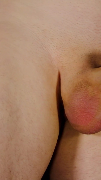 Key moment from "Man masturbating, playing with his flaccid penis and foreskin becomes erect pulls and squeezes his cock"