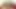 Shemale in a leopard print dress bares her breasts and give a blowjob
