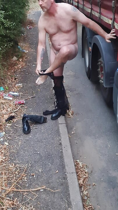 Cock locked sissy sucking dildo outdoors