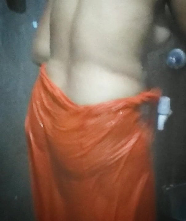 Village housewife bathing