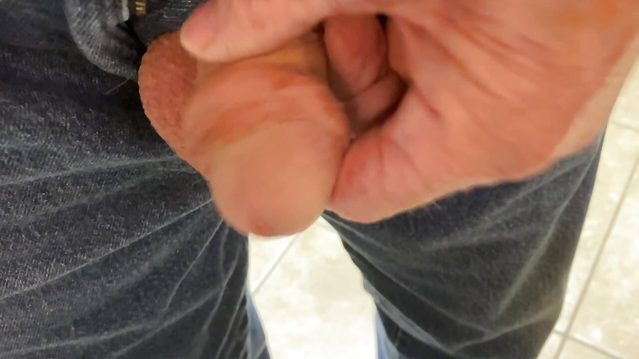 Stroking soft cock