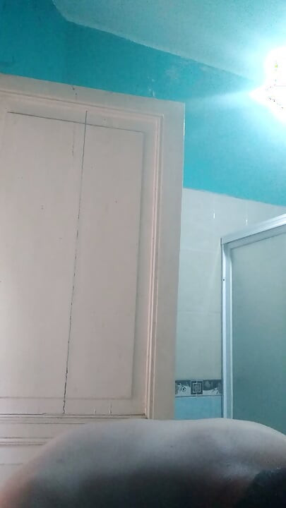Washing my face while caressing my nipples