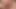 Blonde tranny gets naked and strokes his cock on the couch