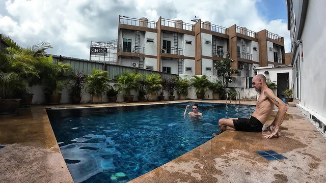 watch us playing in our swimming pool
