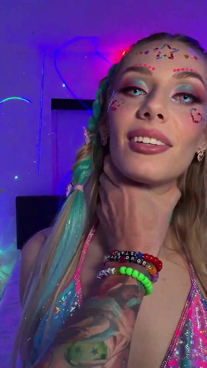 Emily Jade Rides Cowgirl as Her Iridescent Outfit Shimmers Under Neon!