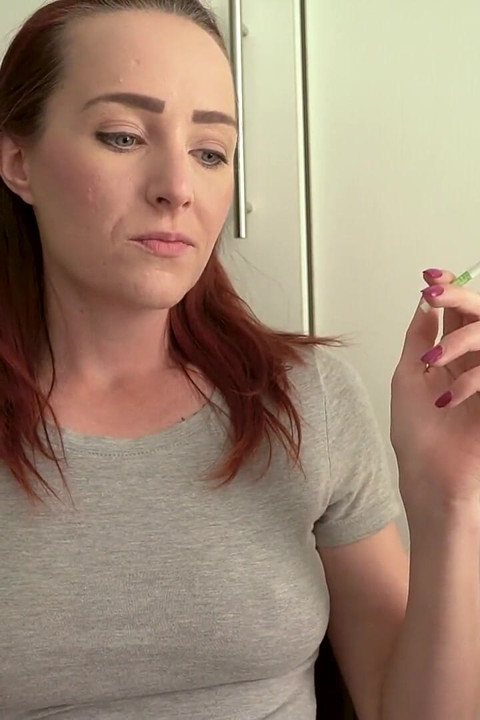Cute Brunette Smoking in a Tight Top