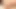 Brunette ladyboy in black dress strokes her long cock on the