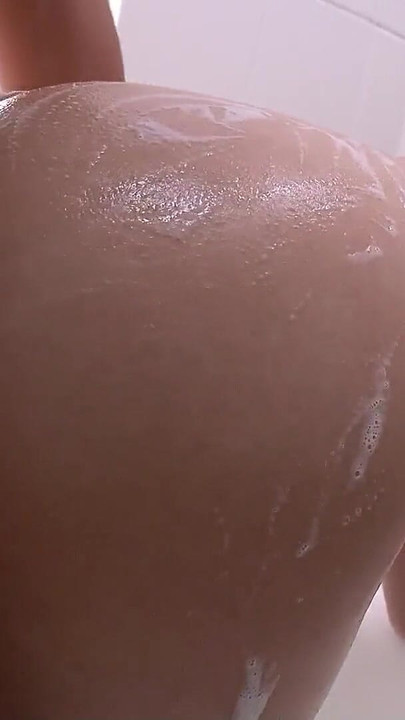 Key moment from "Japanese Mom tricked Virgin Boy to First Time Sex with Soap Shower before Cum in her"