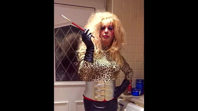 Leopard and latex smoking bimbo Mandy