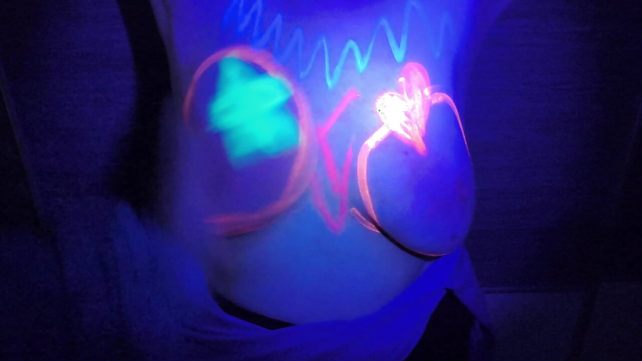 Her tits glowing in the dark
