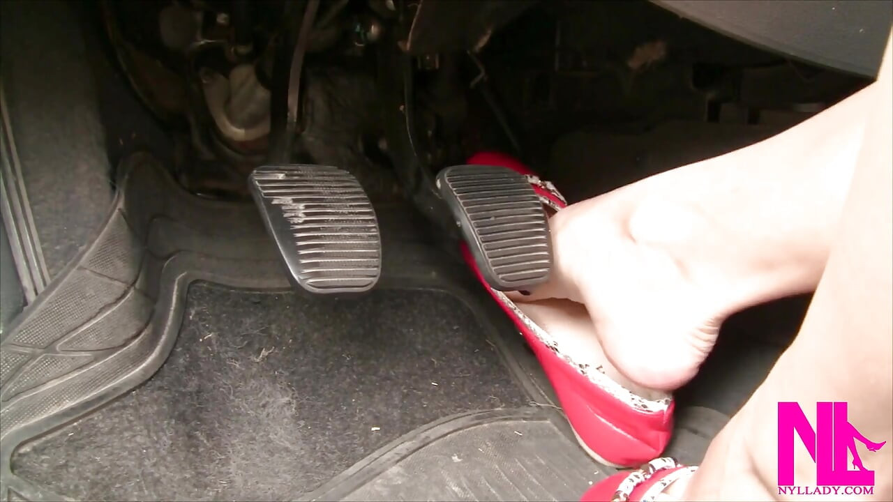 Sexy Barefeet Pedal Pumping in Scarlet Buckled Flats