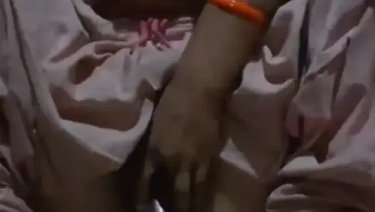 Alone in the house, a woman is calming her pussy with eggplant