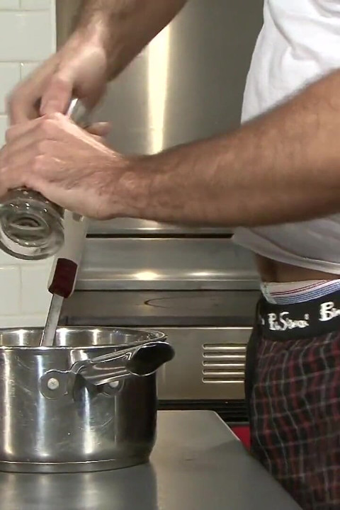Gay cooks the kitchen while his boy is ready to surprise him from the back