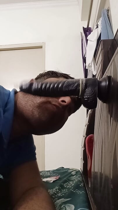Gay bottom huge dildo sucking