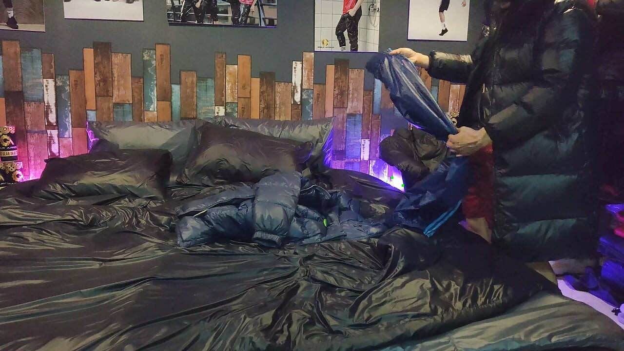 Cock Rubbing Down Jacket on Shiny Nylon Bed