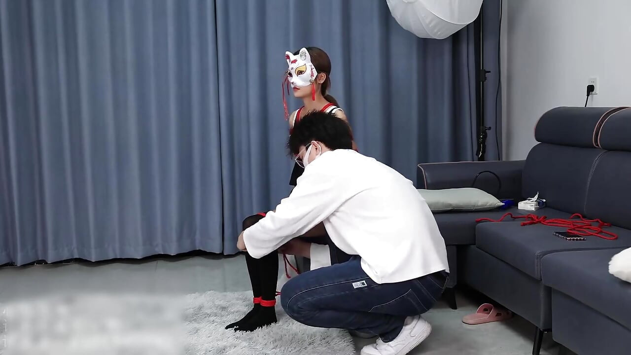 A Young, Beautiful, Slender, and Adorable Girlfriend, with Black Stockings, Red Strings, and Restraints
