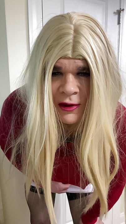 MILF Crossdresser in black thigh high stockings and heels talks fetish talk while wearing a pussy over her cock like a shemale
