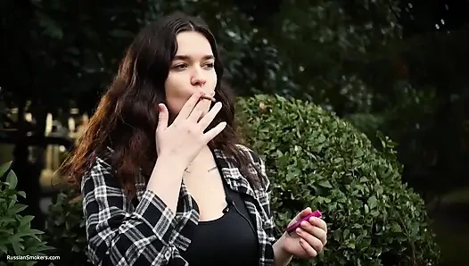 Sweet and Busty Russian Babe Smoking Cigarette in Nature