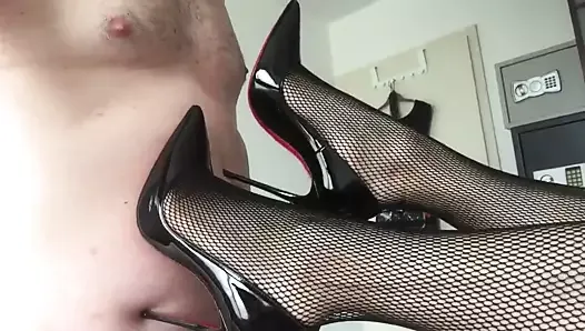 Fingering her asshole with louboutin