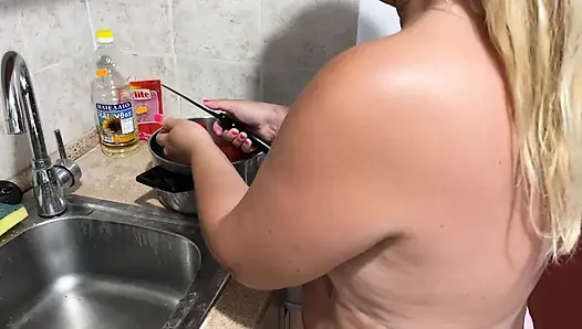 Zara cooks naked in the kitchen