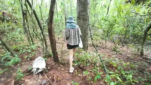 Thai girls walking and talking and picking mushrooms in the forest, secretly showing in the deep forest Clear Thai voice