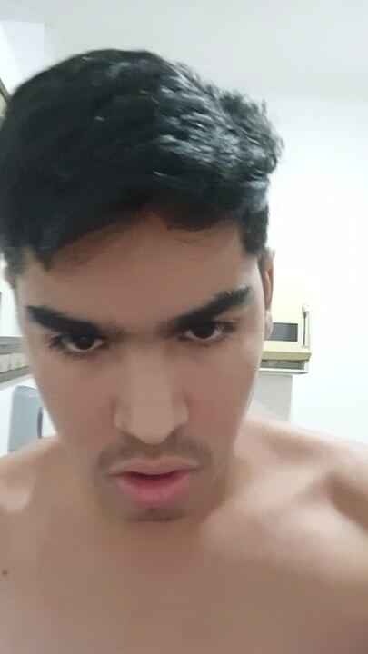 Boy shows his ass in front the camera