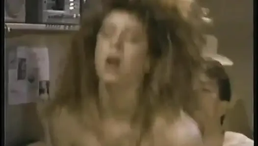 Her massive tits bounce while her pussy is getting penetrated deep by two large cocks