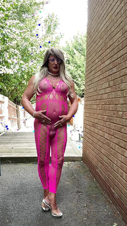 Sexy Crossdresser Kellycd2022's in pink fishnet catsuit and heels