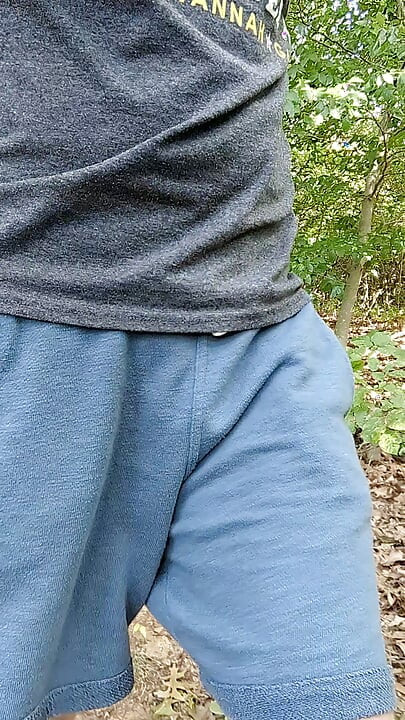 Rubbing myself through my shorts pocket while hiking until I have to stop and cum on the trail
