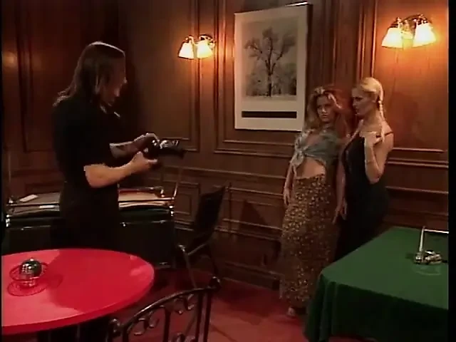 Camera guy gets his cock sucked by two slutty chicks in dining room