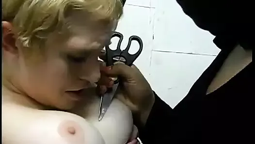 Short-haired kinkster dragged to bondage room by two S and M mistresses